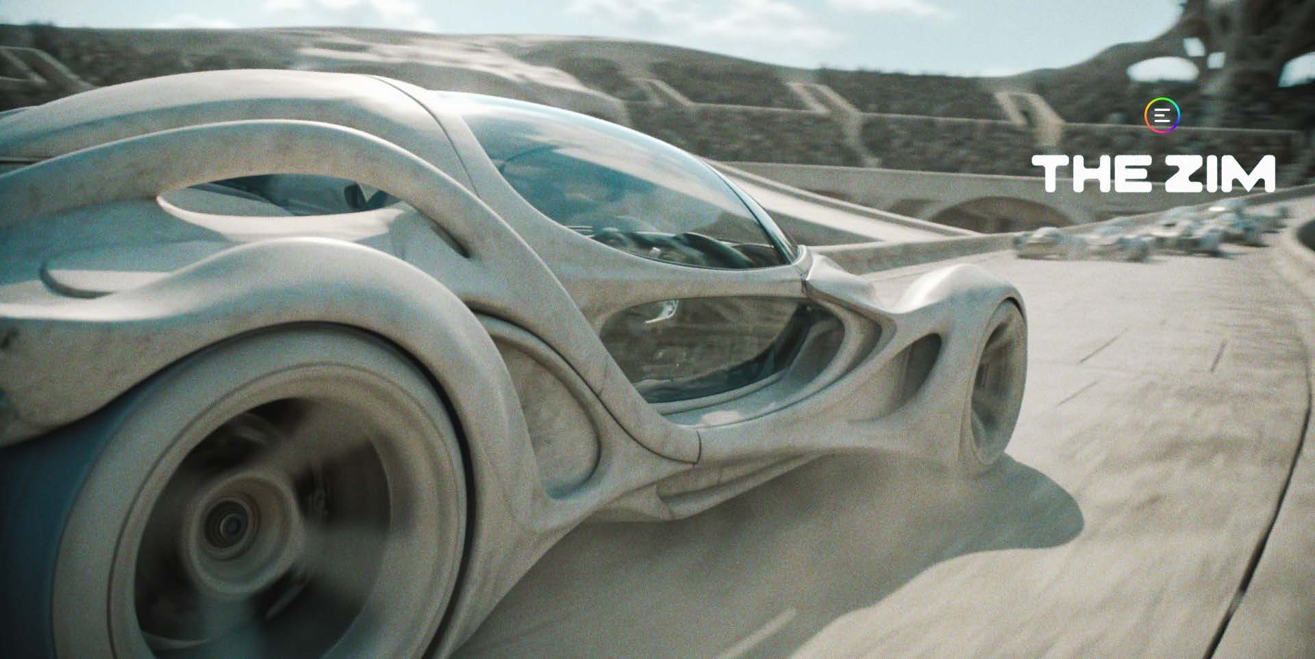 A white, bone-coloured futuristic race vehicle with smooth organic curves and an open skeletal body speeds left-to-right along a pale concrete track; its huge foreground wheel is smeared with rotational motion blur, and 